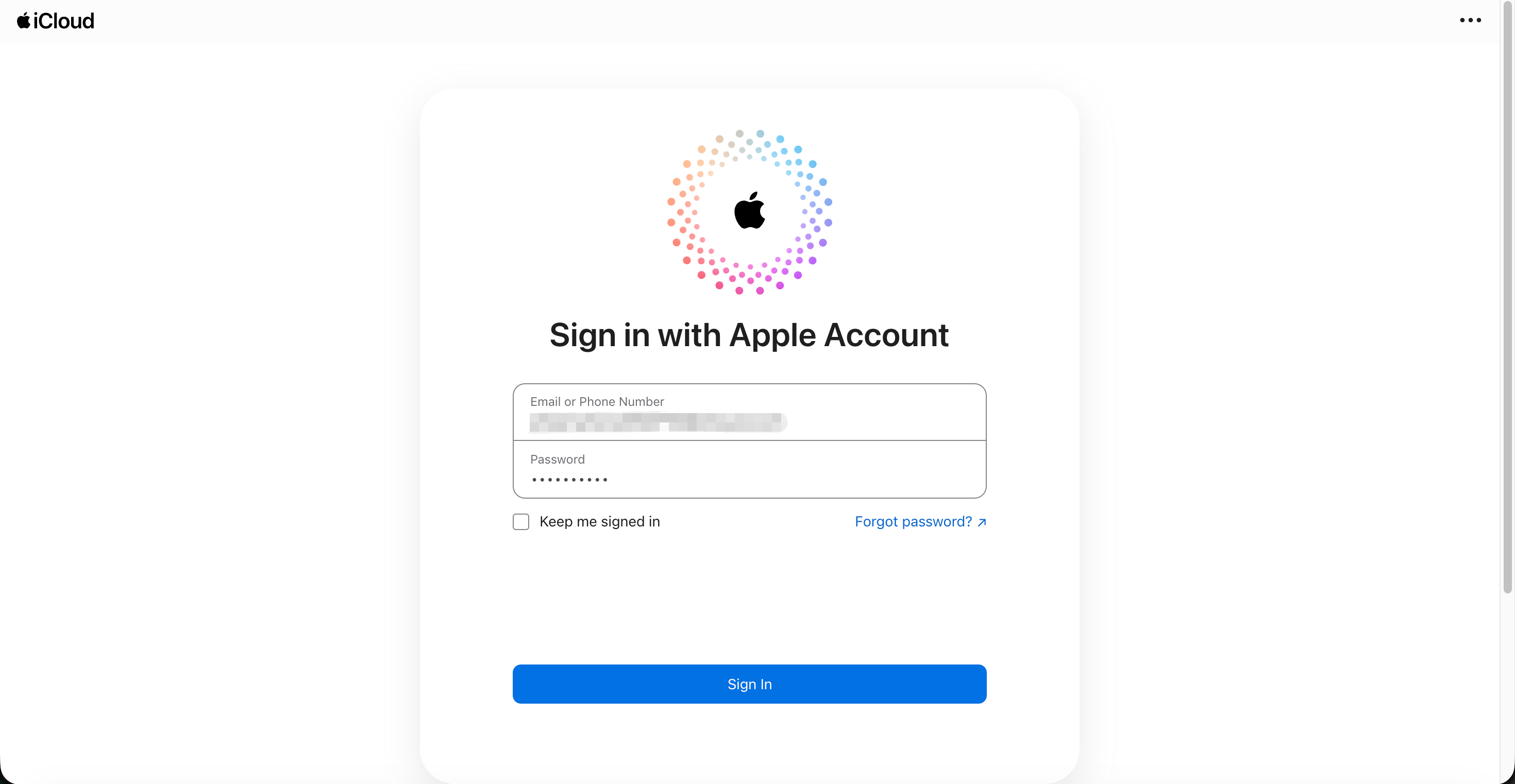 iCloud web sign-in page titled Sign in with Apple Account, with email and password fields and a blue Sign In button